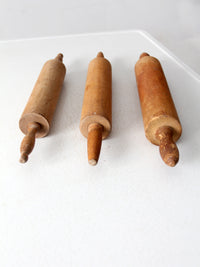 set of antique rolling pins