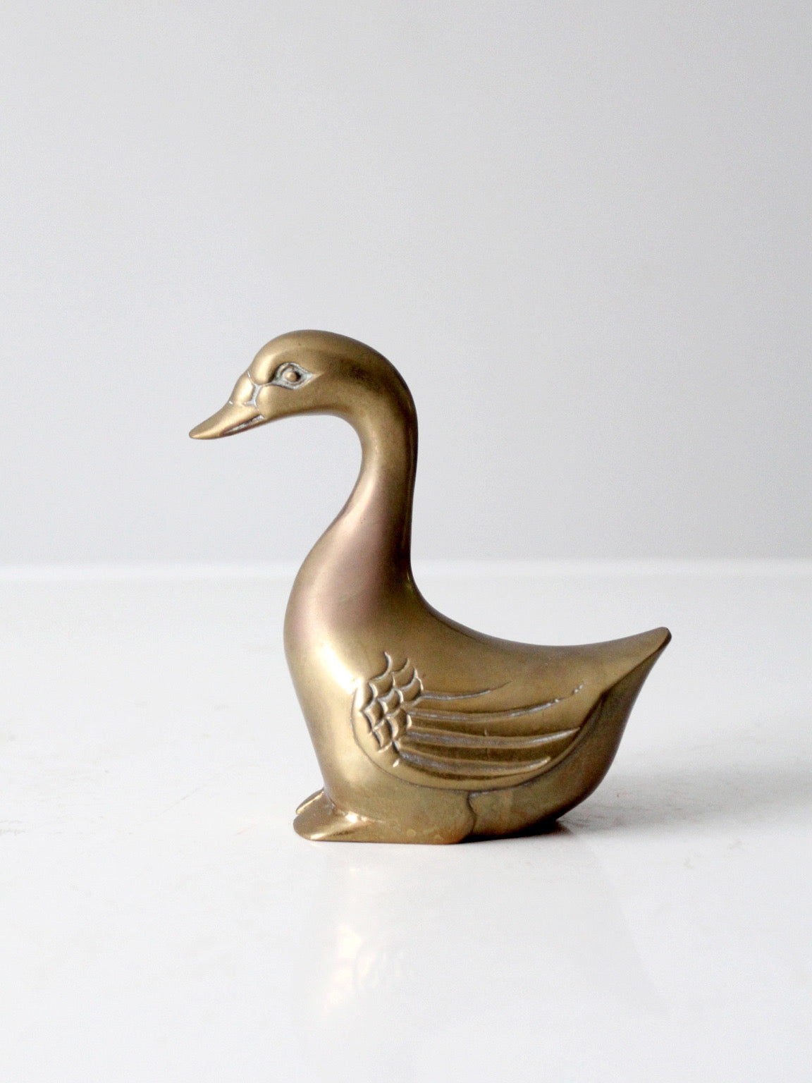 mid-century brass bird figurine