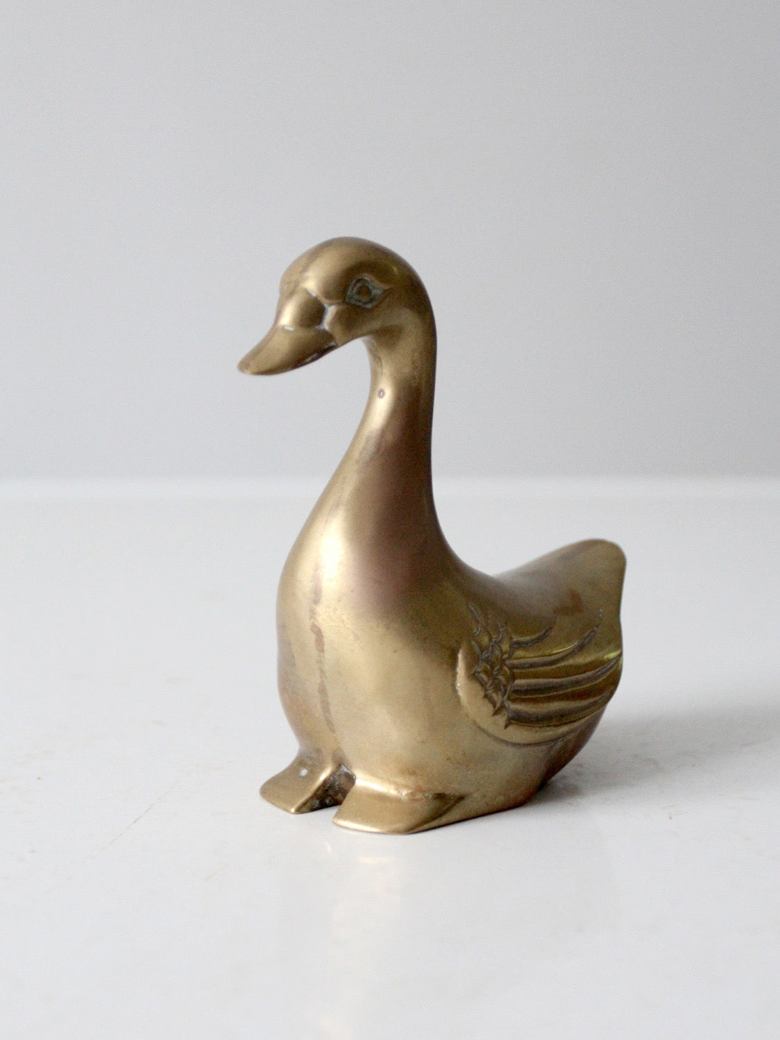mid-century brass bird figurine