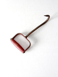 vintage red iron hay hook