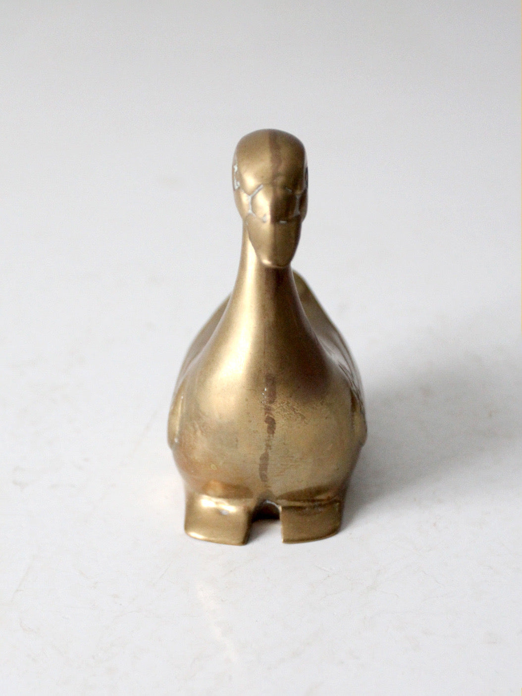 mid-century brass bird figurine