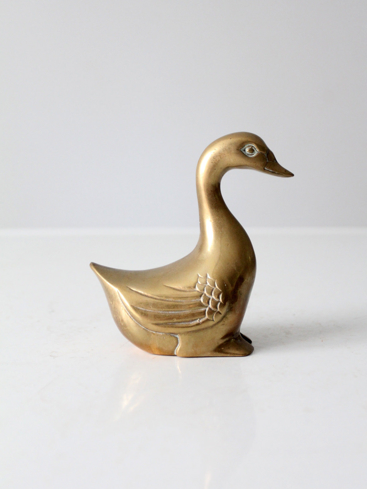 mid-century brass bird figurine