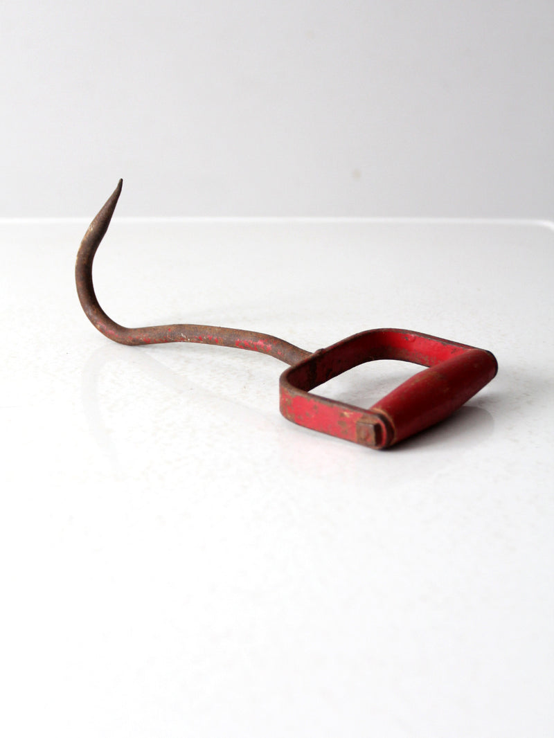 vintage red iron hay hook