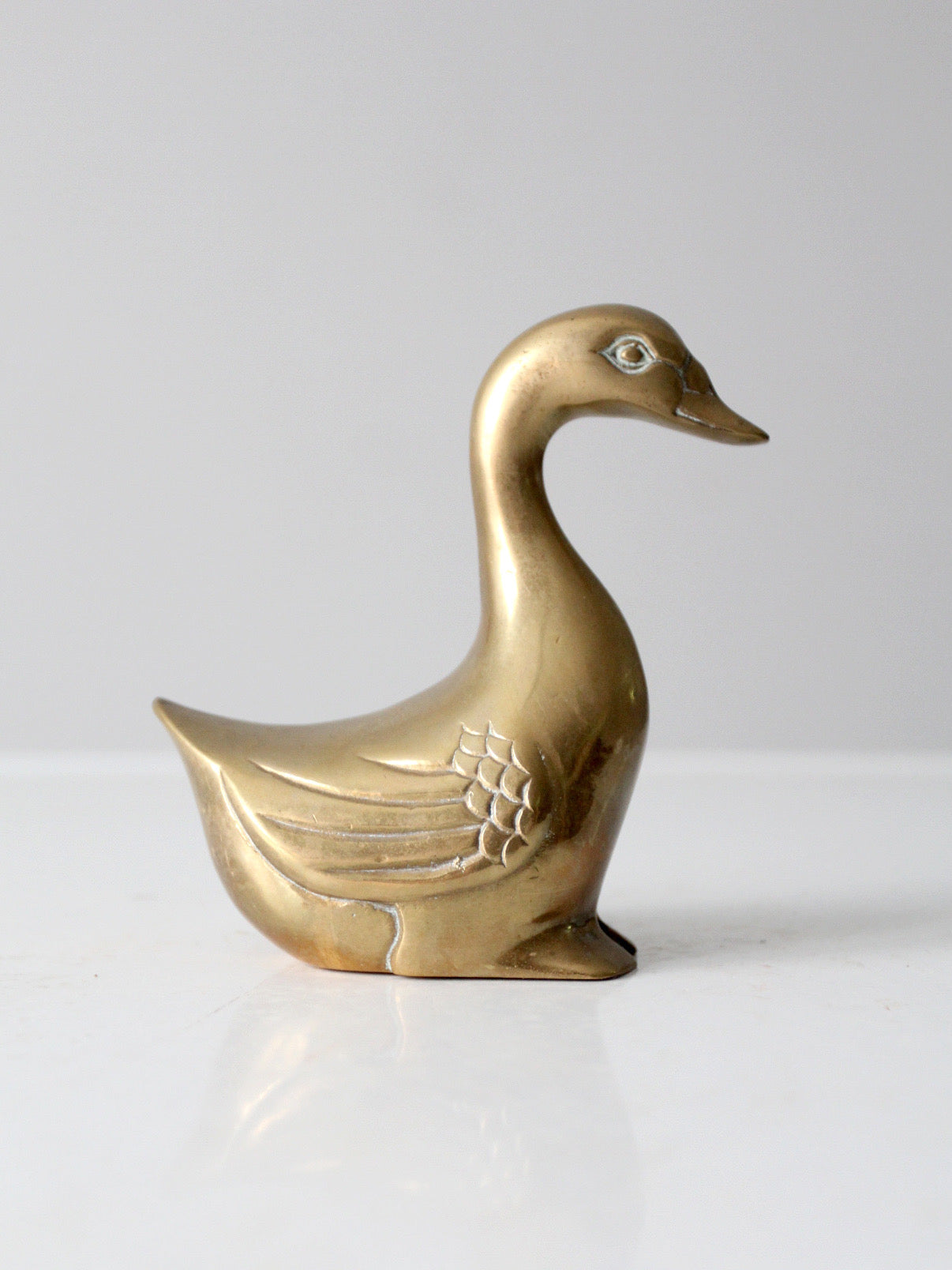 mid-century brass bird figurine