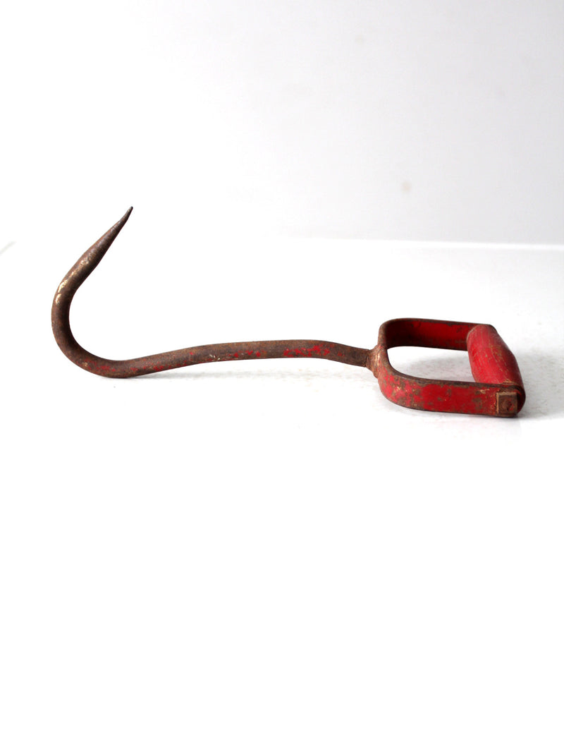 vintage red iron hay hook