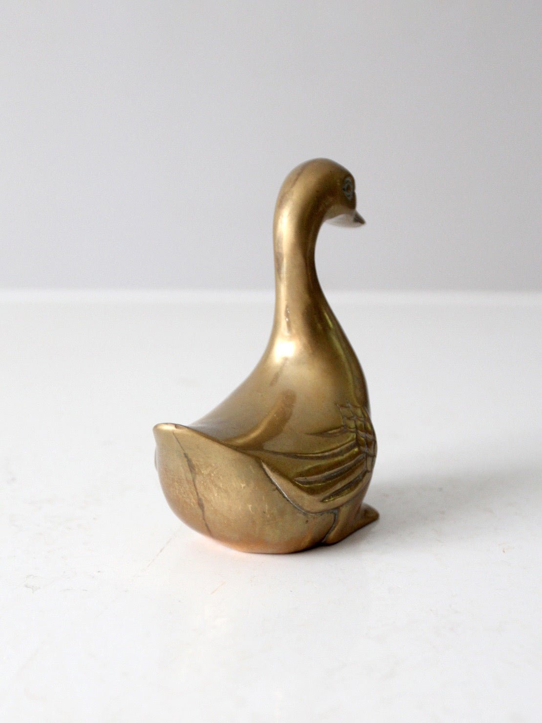 mid-century brass bird figurine