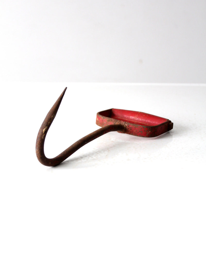vintage red iron hay hook