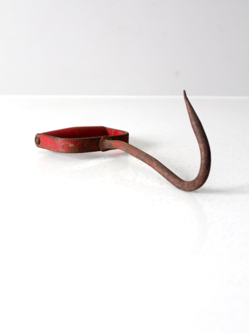 vintage red iron hay hook