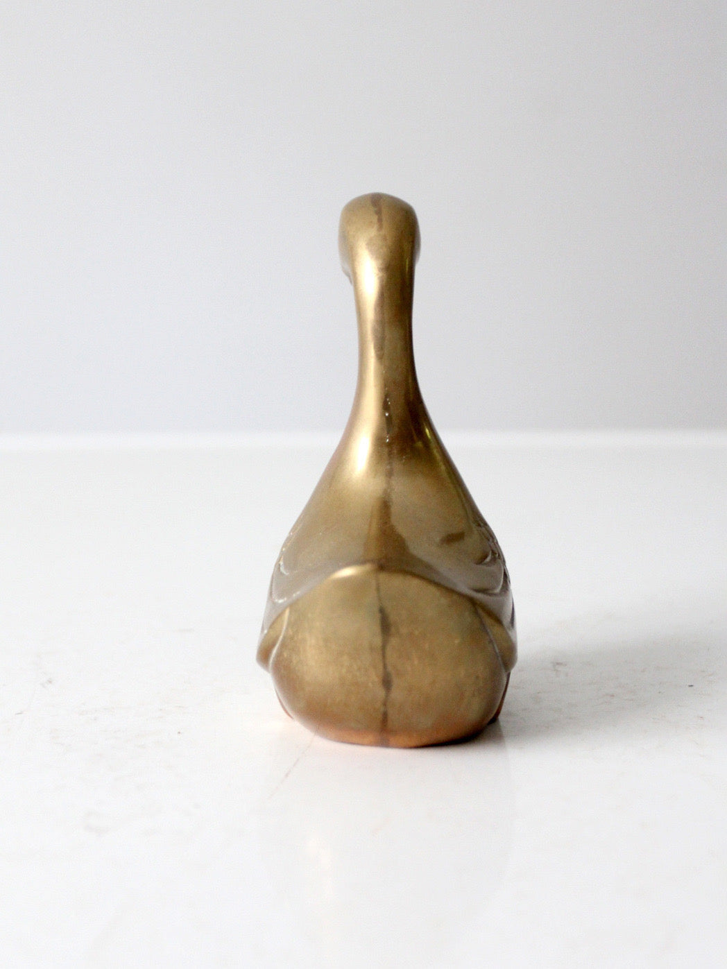 mid-century brass bird figurine