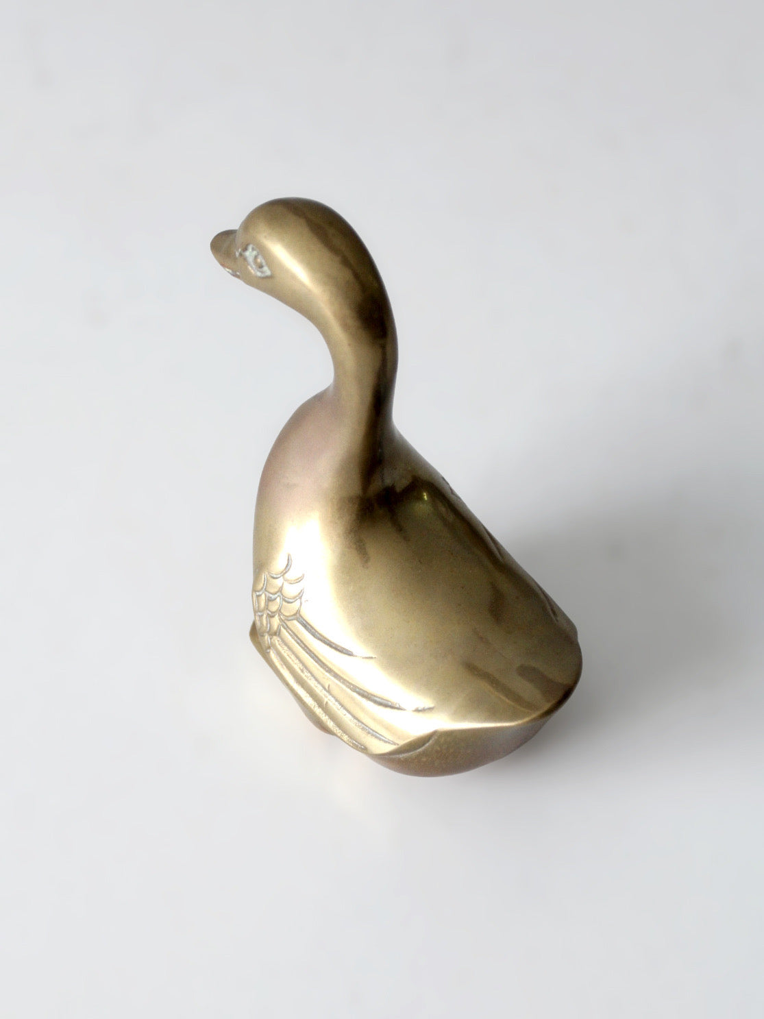 mid-century brass bird figurine