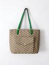 Michael Kors monogram canvas tote bag with green leather handles