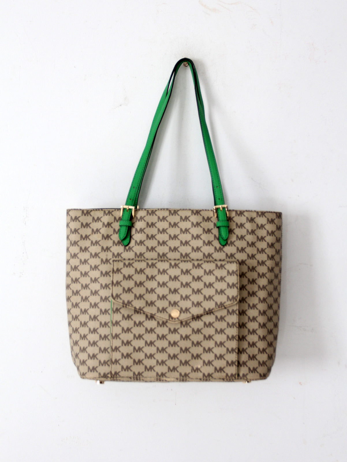 Michael Kors monogram canvas tote bag with green leather handles