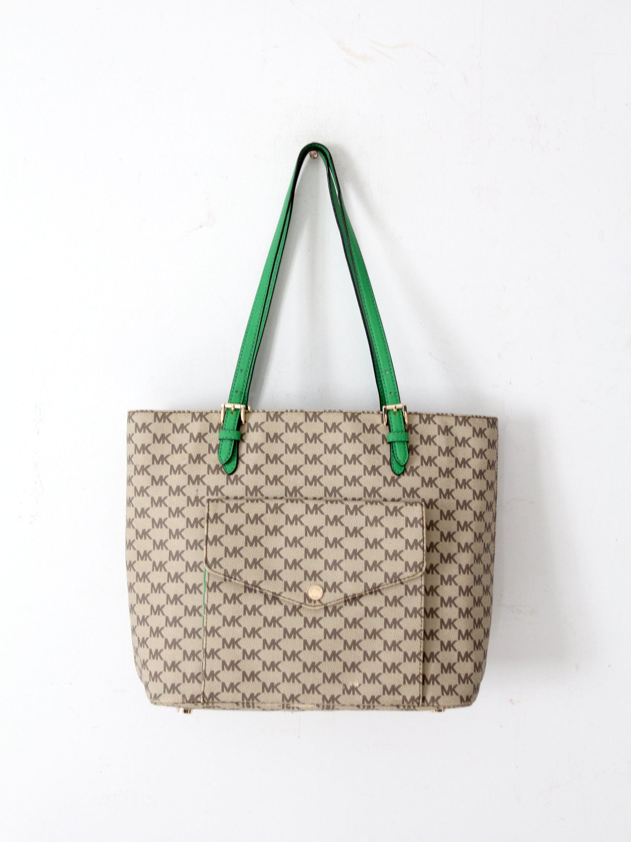 Michael Kors monogram canvas tote bag with green leather handles