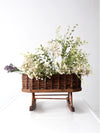 vintage wicker planter basket on rocker base