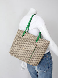 Michael Kors monogram canvas tote bag with green leather handles