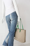 Michael Kors monogram canvas tote bag with green leather handles