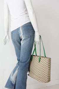 Michael Kors monogram canvas tote bag with green leather handles