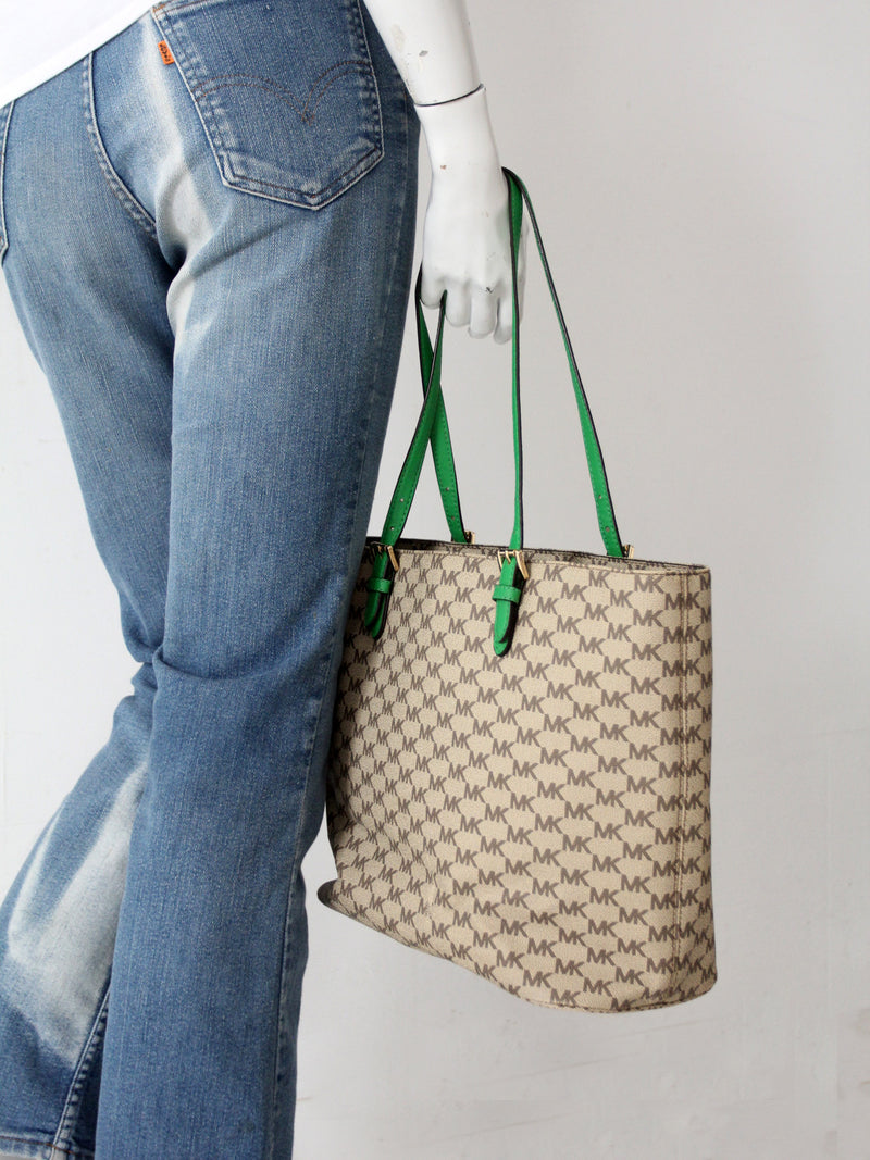 Michael Kors monogram canvas tote bag with green leather handles