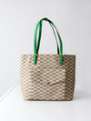Michael Kors monogram canvas tote bag with green leather handles