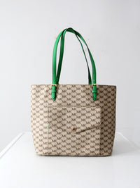 Michael Kors monogram canvas tote bag with green leather handles