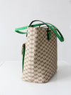 Michael Kors monogram canvas tote bag with green leather handles