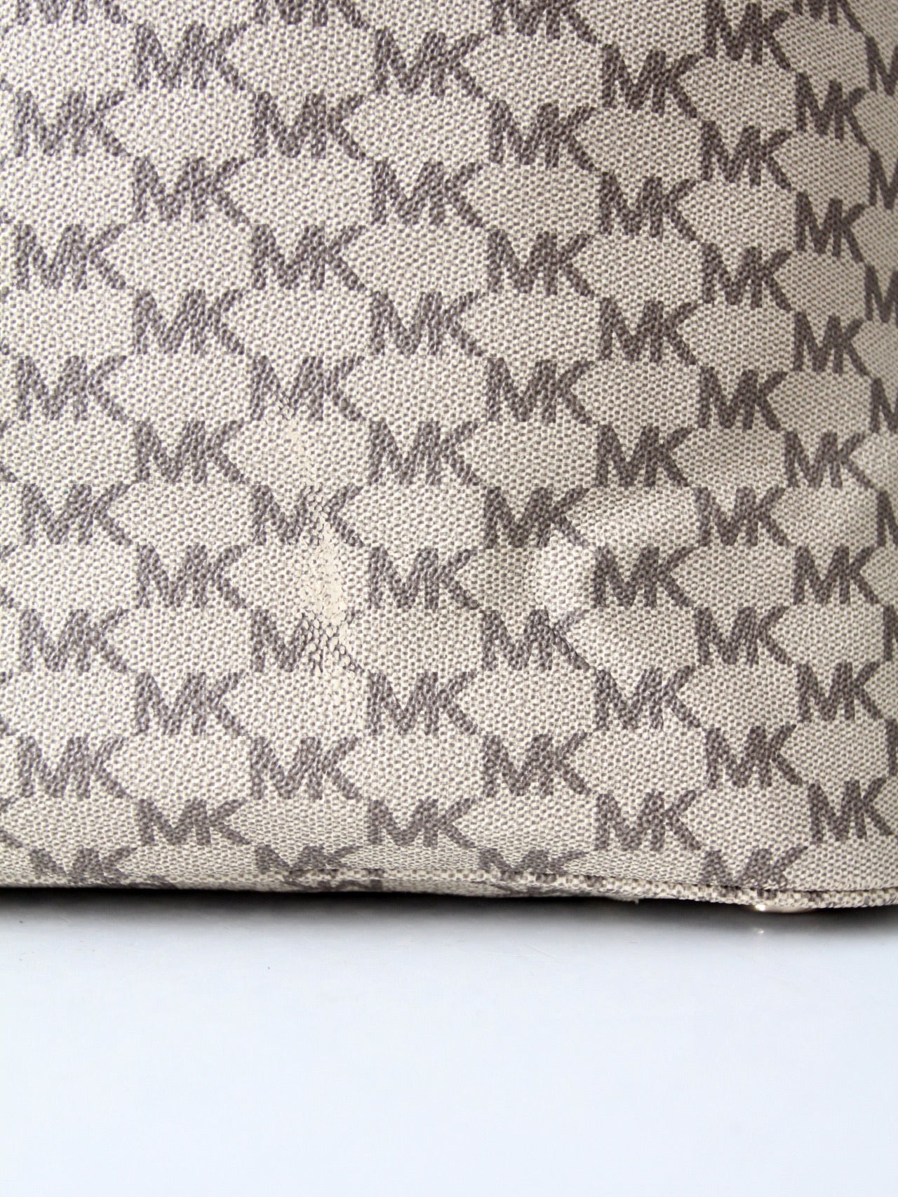 Michael Kors monogram canvas tote bag with green leather handles
