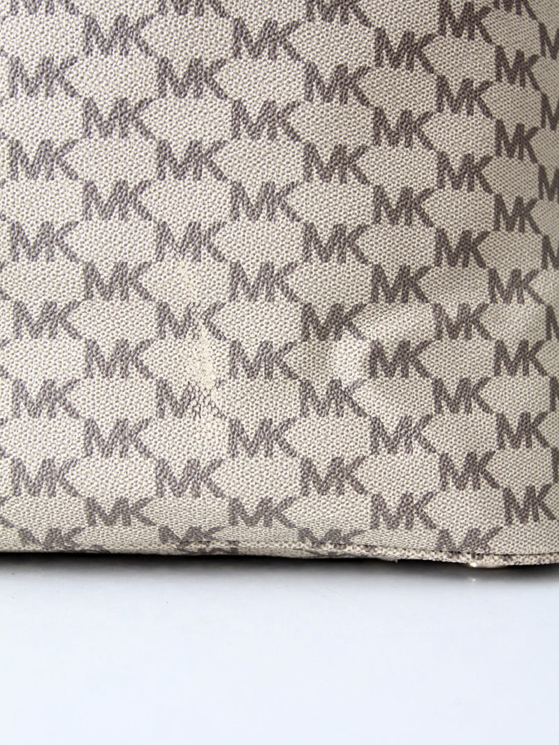 Michael Kors monogram canvas tote bag with green leather handles