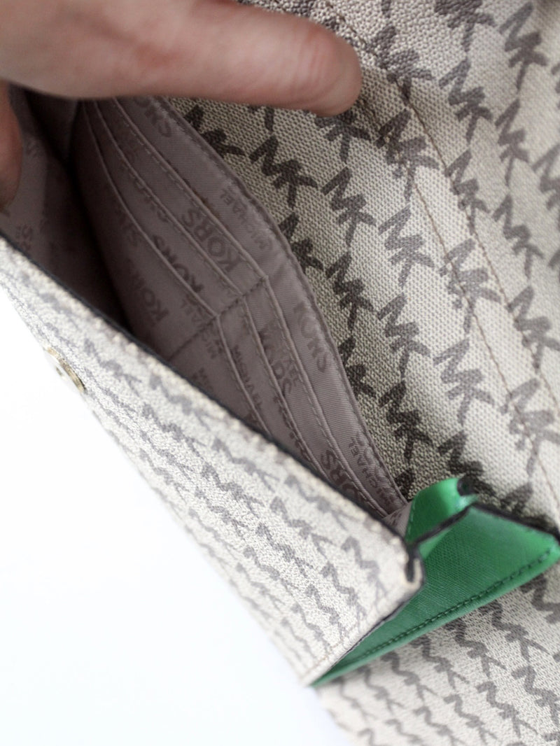 Michael Kors monogram canvas tote bag with green leather handles