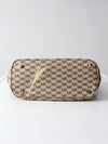 Michael Kors monogram canvas tote bag with green leather handles