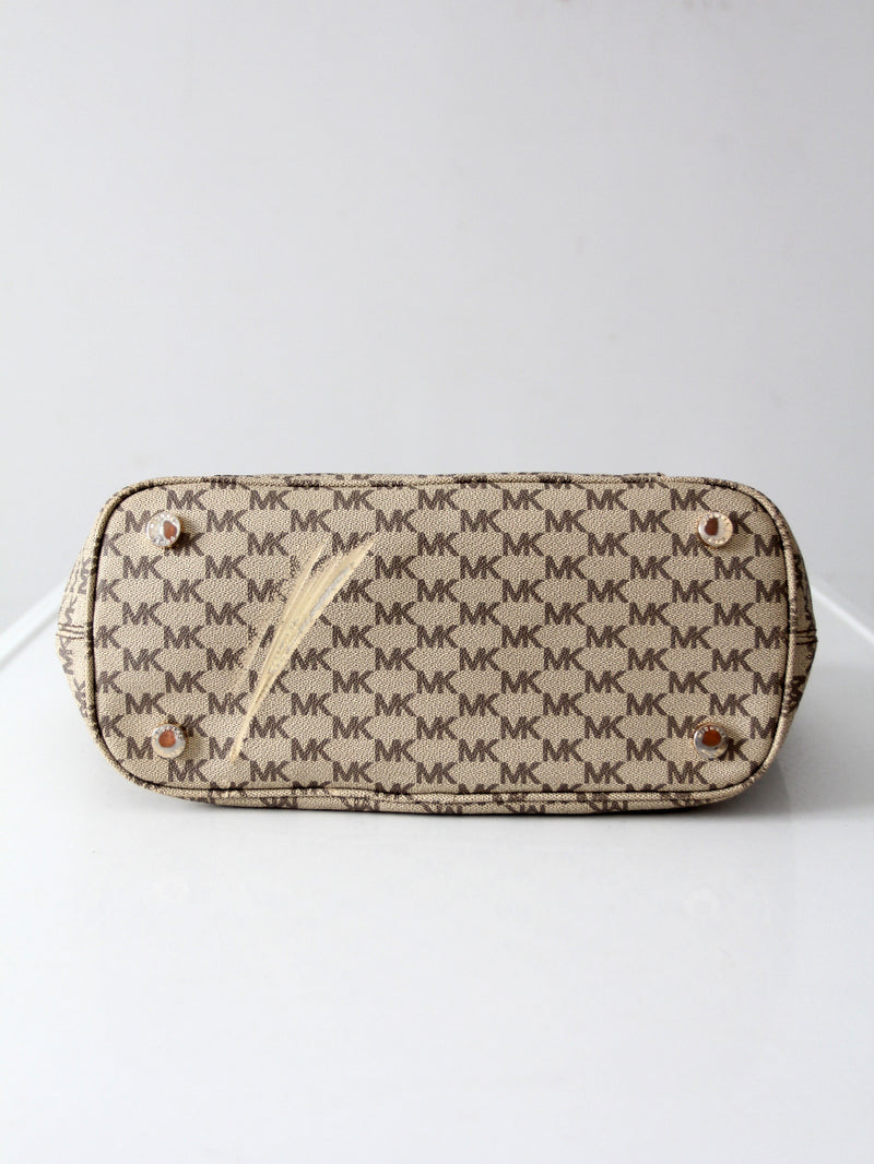 Michael Kors monogram canvas tote bag with green leather handles