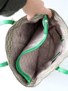 Michael Kors monogram canvas tote bag with green leather handles