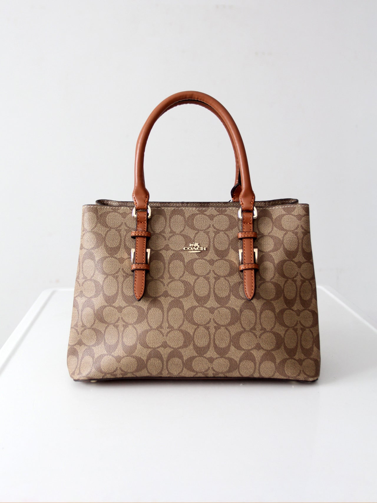 Coach signature coated canvas satchel bag with leather handles