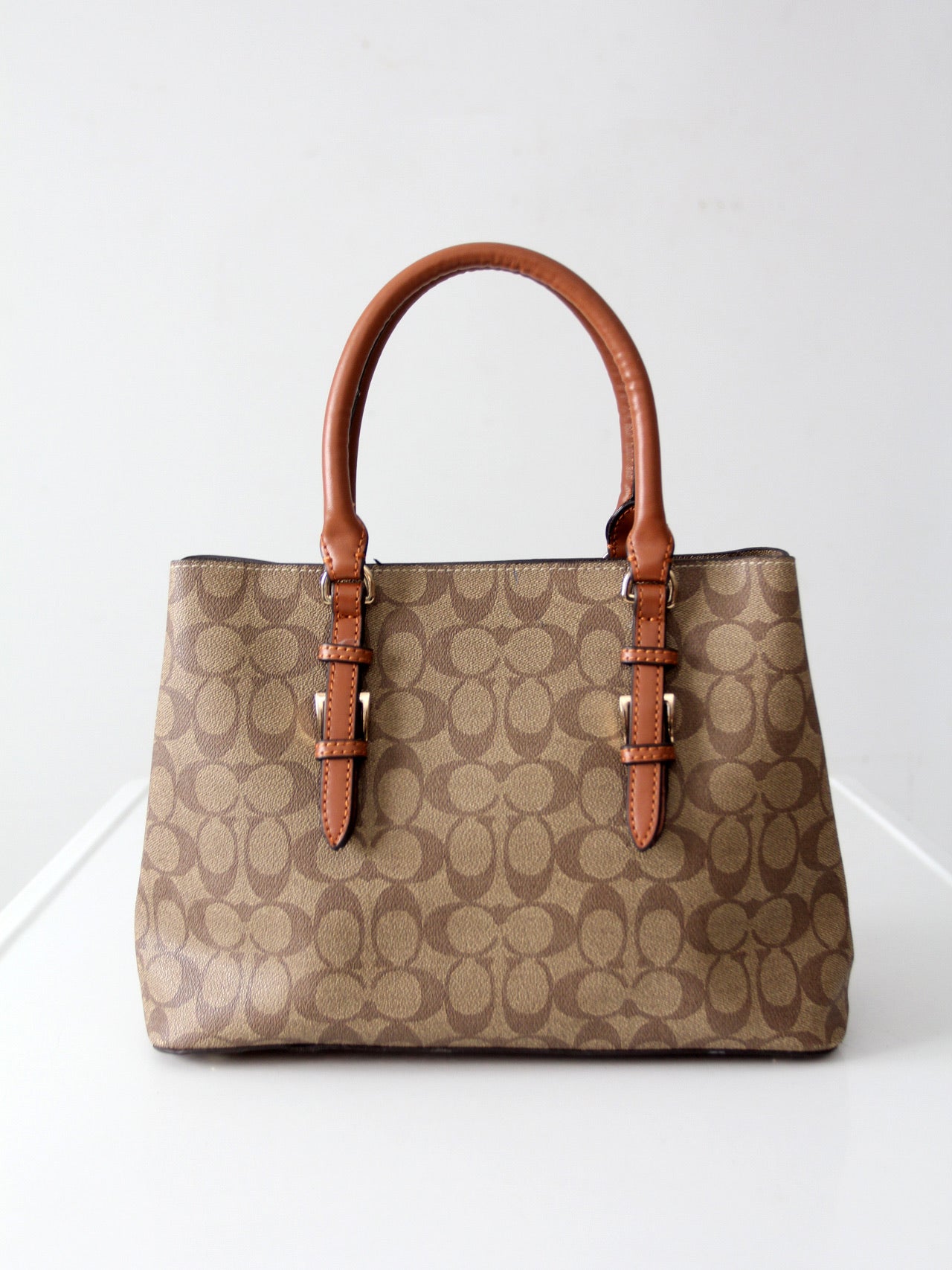 Coach signature coated canvas satchel bag with leather handles