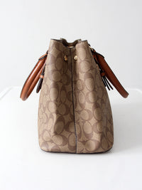 Coach signature coated canvas satchel bag with leather handles