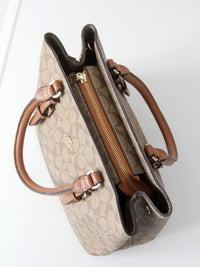 Coach signature coated canvas satchel bag with leather handles