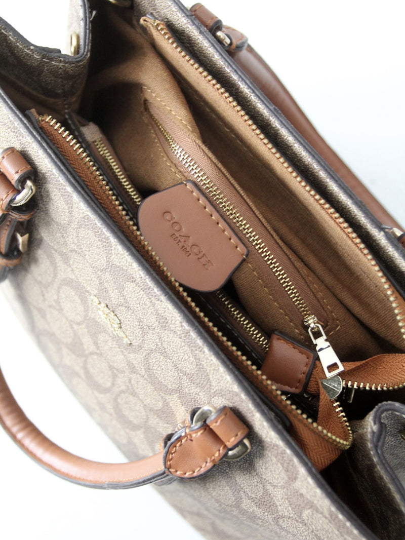 Coach signature coated canvas satchel bag with leather handles