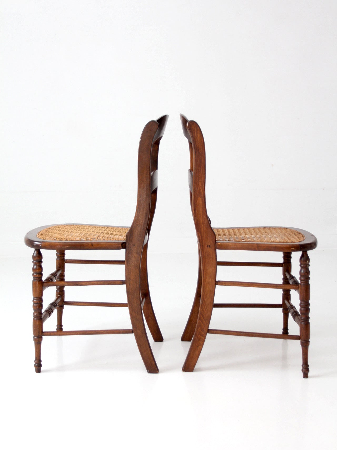 antique cane seat dining chairs pair
