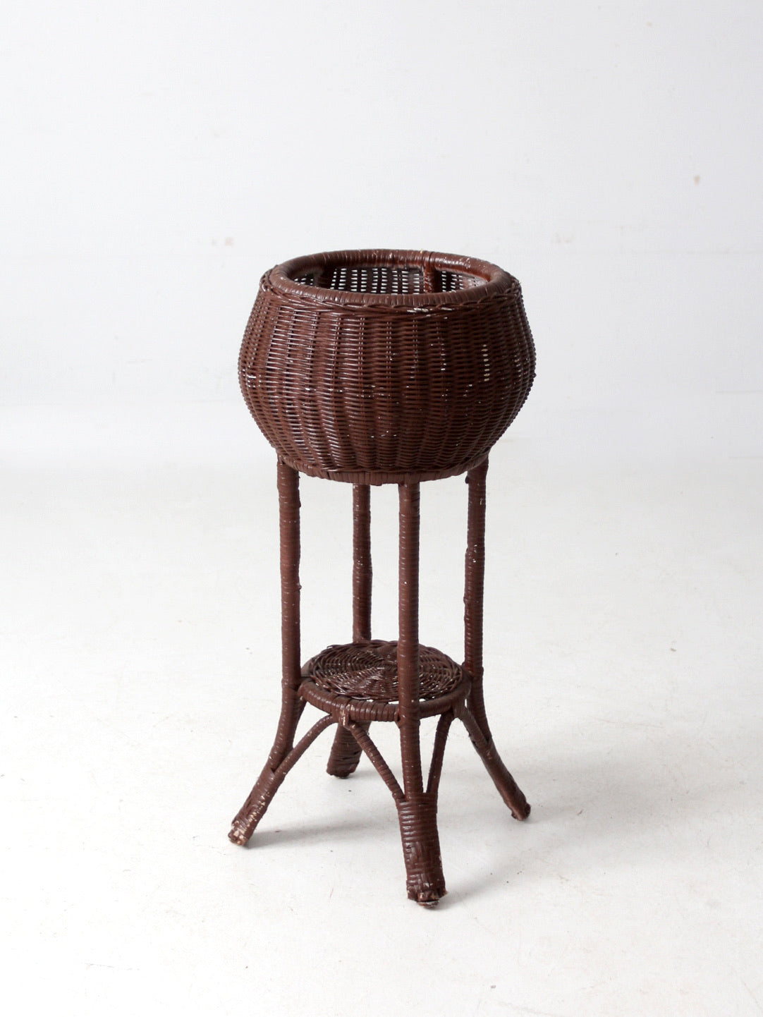 vintage wicker plant stand