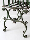 antique cast iron magazine rack
