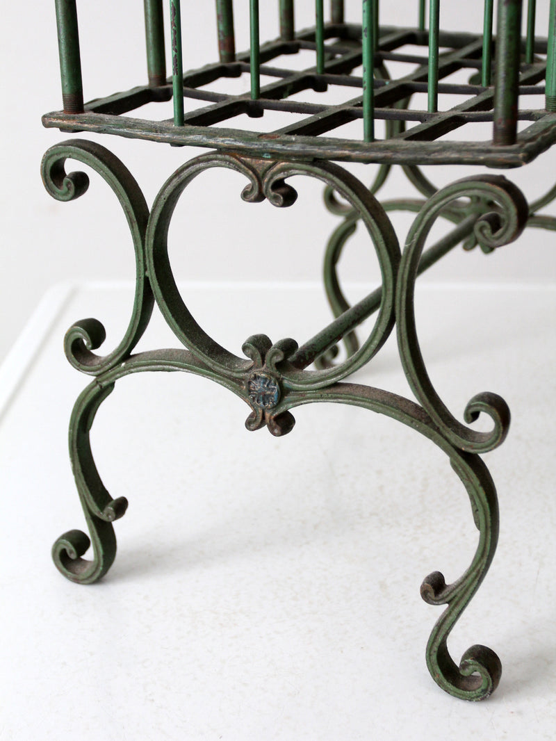 antique cast iron magazine rack
