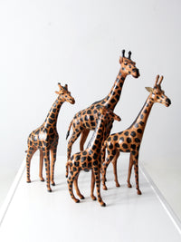 vintage leather giraffe figurines collection