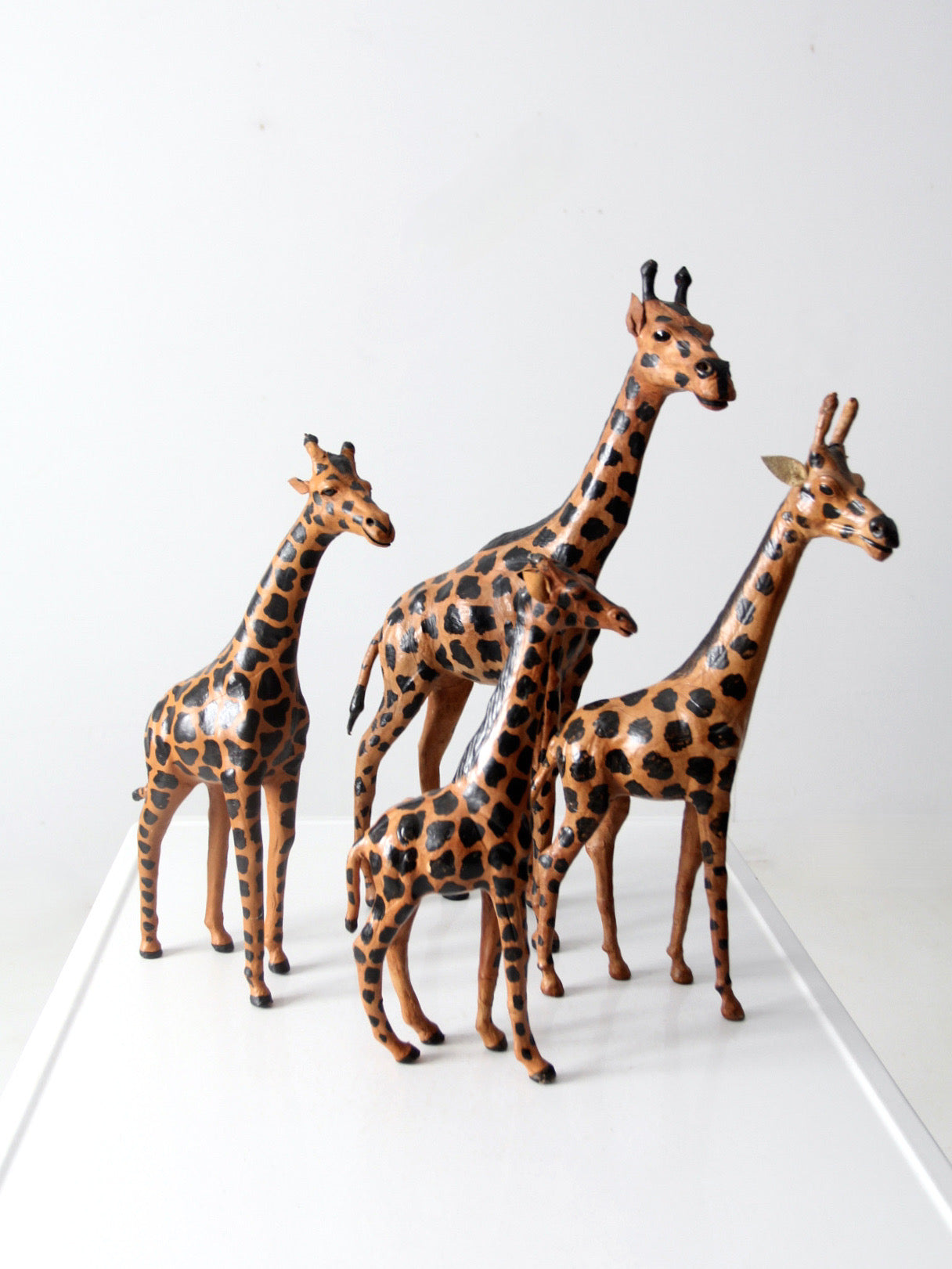 vintage leather giraffe figurines collection