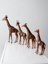 vintage leather giraffe figurines collection
