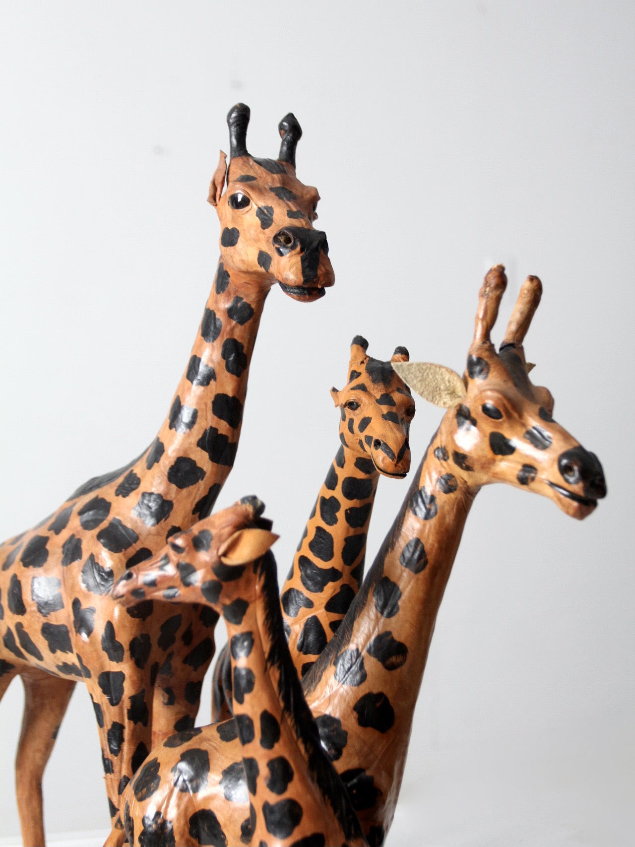 vintage leather giraffe figurines collection
