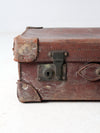 antique leather travel case with railway stickers