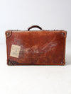 antique leather travel case with railway stickers