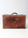 antique leather travel case with railway stickers