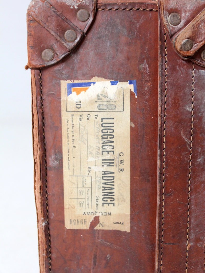 antique leather travel case with railway stickers