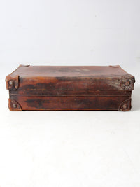 antique leather travel case with railway stickers