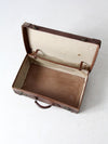 antique leather travel case with railway stickers